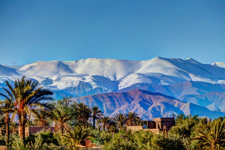 "Snow-covered High Atlas Mountains in Morocco, offering a picturesque setting for trekking in the Atlas Mountains and outdoor exploration.