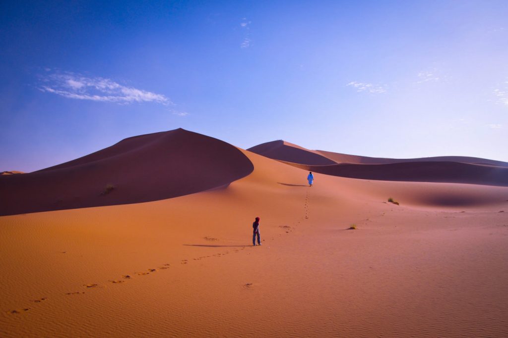 Golden dunes of Zagora at sunset, the gateway to the Sahara Desert in Morocco