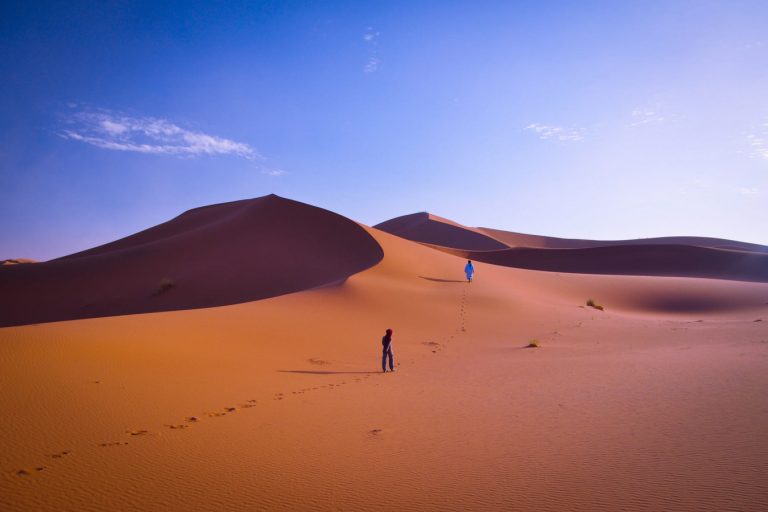 best Morocco tour from Canada showcasing Sahara Desert, Marrakech souks, and Chefchaouen blue streets