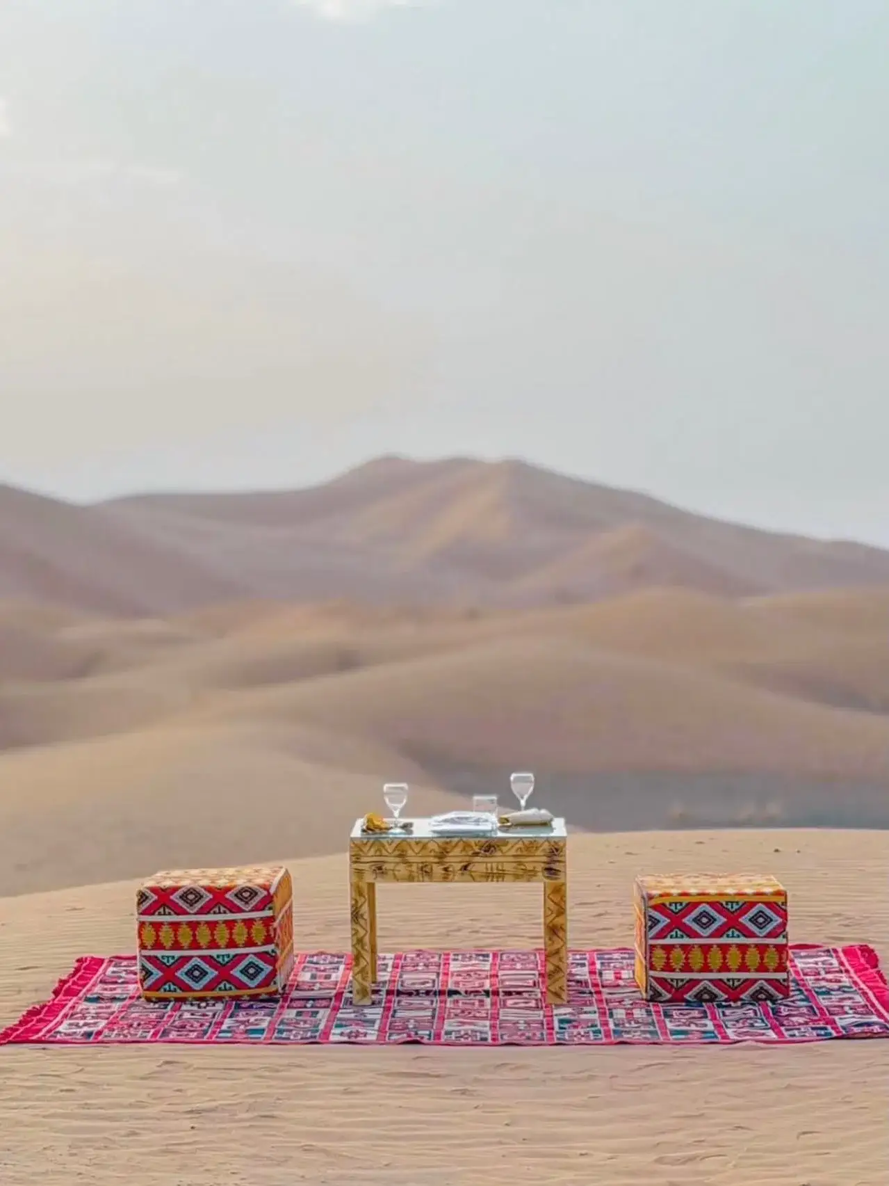 Camel caravan crossing the Sahara dunes on a Traveling Morocco desert tour