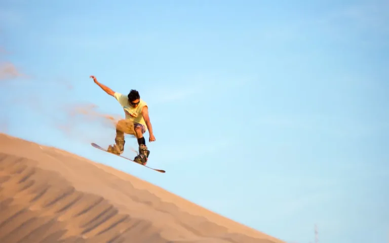 Sandboarding on a Morocco desert tour